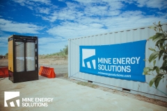 Mine Energy Solutions High Density Compressed Natural Gas HDCNG dual fuel pack next to MES branded container Thumbnail